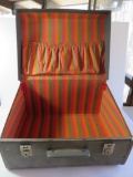 Vintage travel case with brightly colored interior