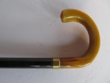 Decorative cane, carmel colored top
