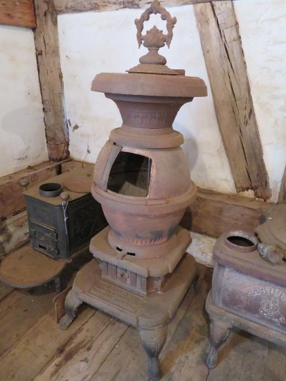 Cast iron pot belly stove, 54" tall, Globe, Brand Stove Co Milwaukee