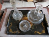 Two glass etched decanters, metal ashtray and decorated tray