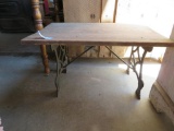 Cast metal base table