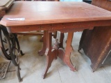 Walnut spoon carved parlor table, 30