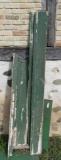 Green painted distressed boards and shelf