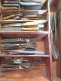 Very early flatware with metal inlay and early tin serving pieces in wooden flatware boxes