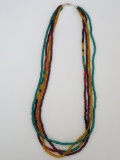 Four strand multi colored glass beaded necklace, 28
