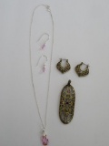 Two necklace and earring sets
