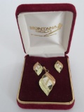 Two tone pendant and earring set