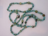 Long turquoise beaded necklace with buffalo nickel clasp