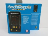 1980 Electronic Space Invader hand held arcade game by Entex with box and instructions