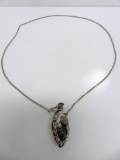 Perfume bottle necklace with inset stones