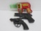 Three vintage toy guns, space and Marx