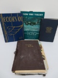 Military books, yearbooks and scrapbook from pilot in photo and uniform