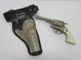 Gene Autry metal holster and Hubley Marshal cap gun