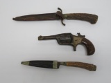 Two antler handled knives and non functional wall hanger revolver