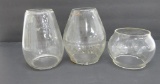 Three glass lantern globes