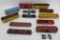 12 Assorted HO train cars, tanker, box cars and lumber cars