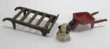 Cast iron Arcade wheelbarrow, hand cart and google eye Fido dog