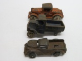 Three Cast iron trucks and car