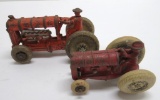 Two cast iron tractors, one marked Arcade, 3 1/2