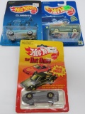 Three vintage Hot Wheels on blister pack, The Hot Ones and Classics
