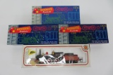 Four Roadhouse and Bachman HO train cars and engine/tender with boxes