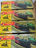 Four Roadhouse HO Model train cars with boxes