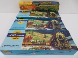Four Athearn and Roadhouse Products HO Train models in boxes