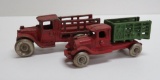 Two Cast Iron stake bed trucks, 4 1/2