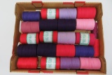 20 spools of Mayville carpet warp, purple, pinks and reds, 4