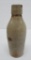 Grisbaum & Kehren stoneware bottle, 7 3/4