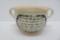Early Motto chamber pot with frog on interior, 10