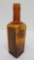 Sherman Primley Iron and Wahoo Tonic bottle, amber, paper label, 8 3/4