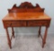 Flaming Mahogany table with two drawers and backsplash