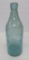 Large blob top bottle, F Schultz Prairie DuChien Wis, aqua, 10 1/2