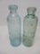 Burlington and Janesville Hutch bottles, blue and green