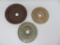 Three stoneware churn lids, 7