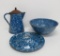 Three pieces of blue and white swirl enamelware