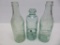 Three Oconomowoc bottles, crown and Hutch