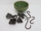 Stoneware bowl, cookie cutters and wrought metal pot hooks