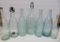 Seven large Wisconsin Beer and Soda bottles, clear and aqua, 9 1/2