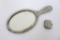 Ornate hand mirror and Woodworth compact, New York-Paris