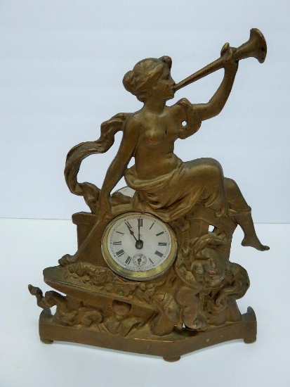 Metal Waterbury clock, 12". woman and cherub