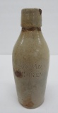 Grisbaum & Kehren stoneware bottle, 7 3/4