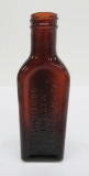 Father John's Medicine bottle, amber, 7 1/2