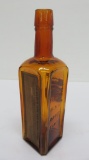 Sherman Primley Iron and Wahoo Tonic bottle, amber, paper label, 8 3/4