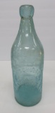 Large blob top bottle, F Schultz Prairie DuChien Wis, aqua, 10 1/2
