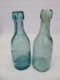 Two Milwaukee aqua blob top bottles, 7 1/2