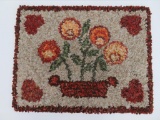 Rust floral hook rug, 24