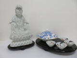 Oriental lot with statue and