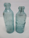 Two Milwaukee aqua Hutchinson Bottles, Heiler and Obermann